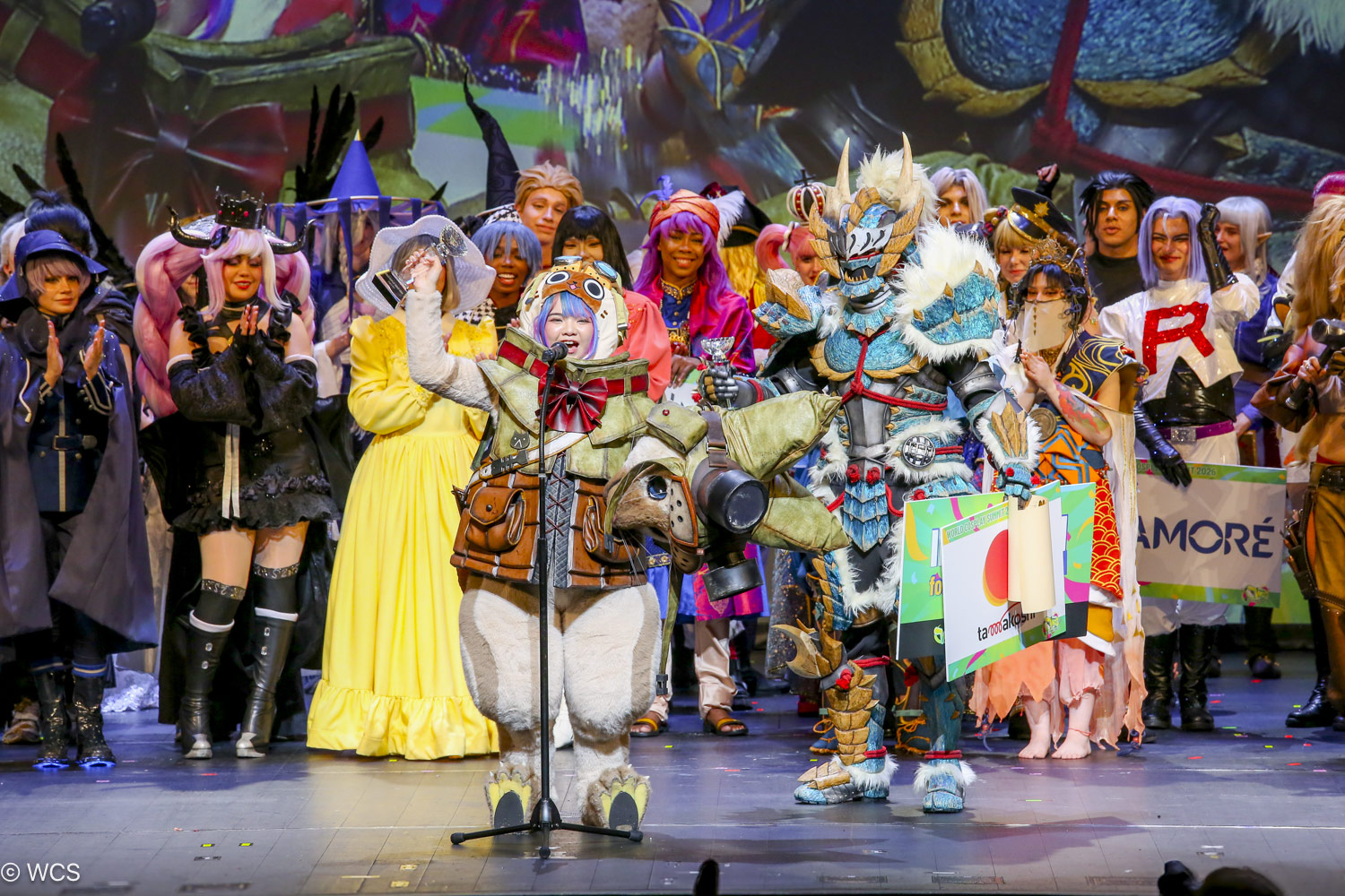 International cosplay champions celebrating on stage